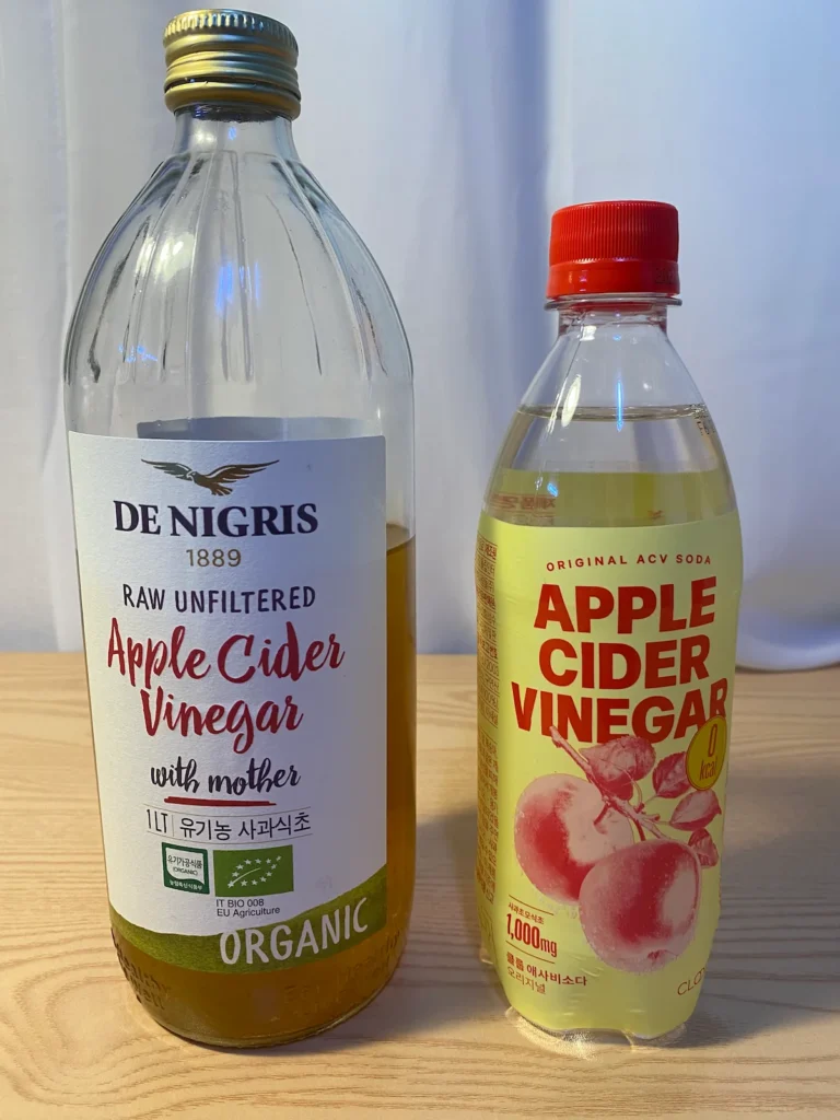 Comparison of De Nigris Organic Apple Cider Vinegar and a ready-to-drink ACV soda bottle.