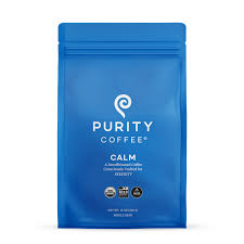 A close-up of a high-quality coffee bag with organic and toxin-free certification labels.